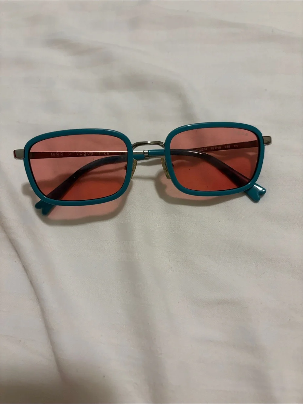 Vogue Teal Frame Sunglasses with Pink Lenses
